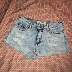 Blue shorts with holes